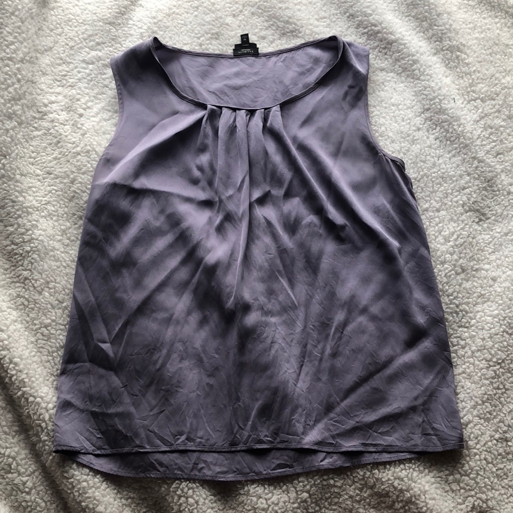 This beautiful blouse is from Talbots. This is very new just  did not fit.